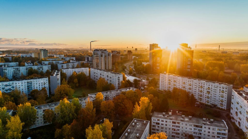 sunset behind city skyline