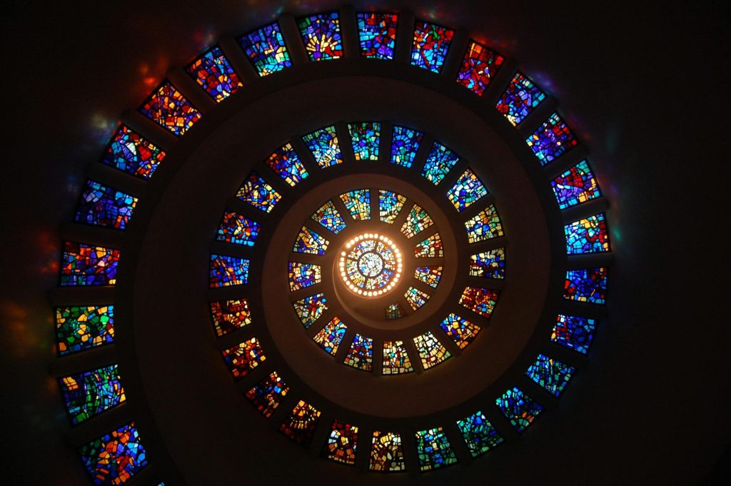 stained glass windows arranged in a spiral